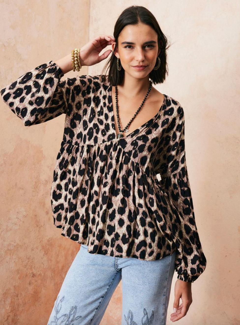 Blusa manga larga con lineas doradas Umbrale