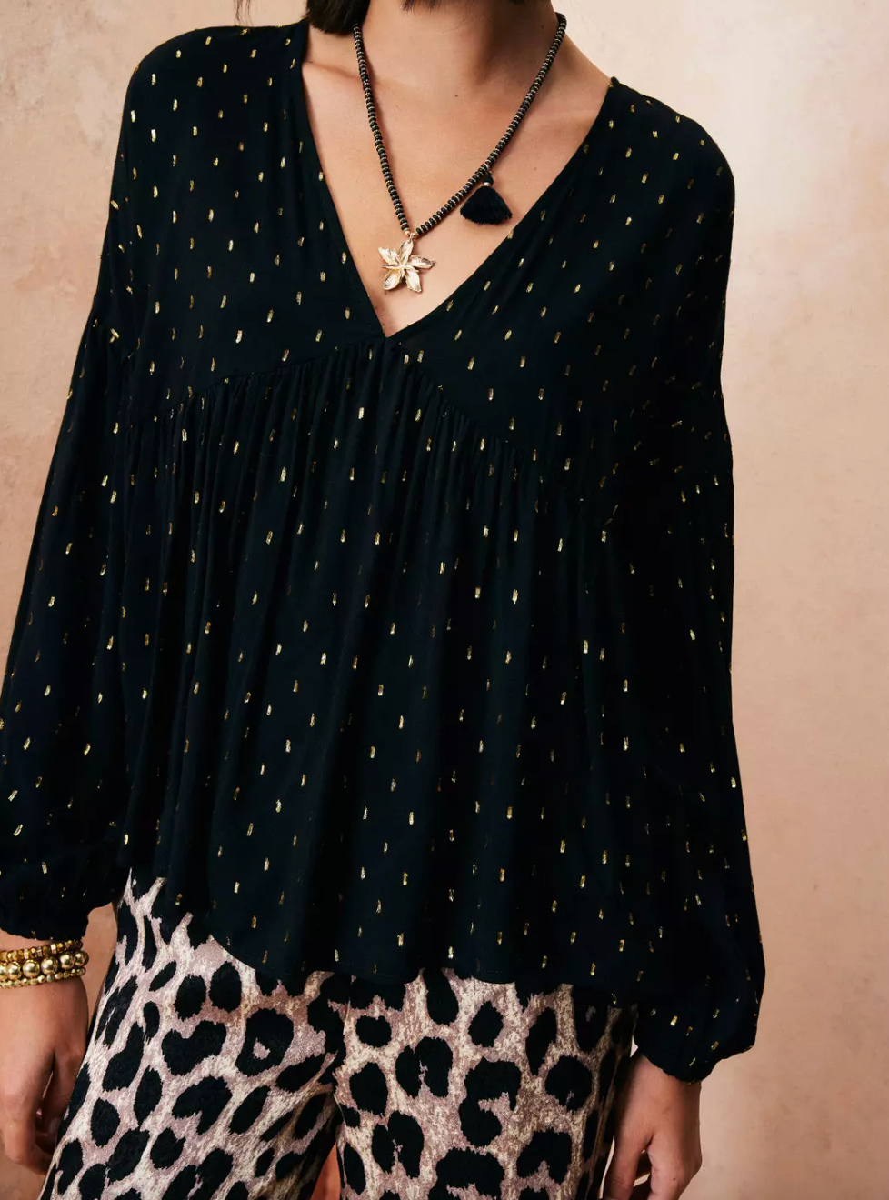 Blusa manga larga con lineas doradas Umbrale