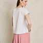 Polera cuello V con bordado Greenfield